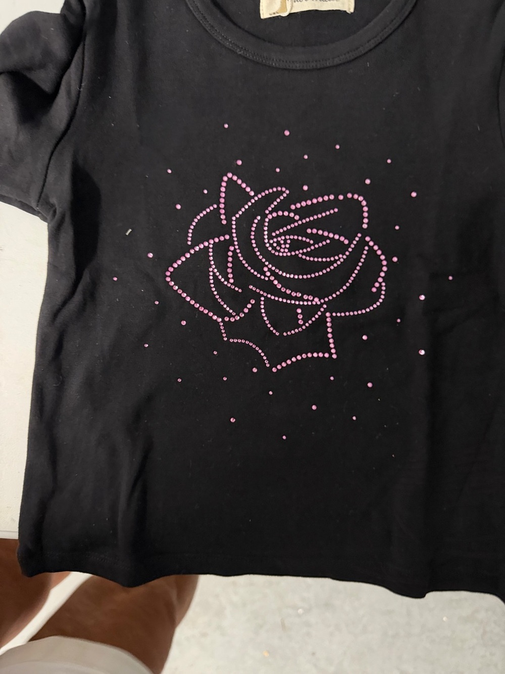 Girl, size 4 black cotton T-shirt with rose embellishment new with tags from doe